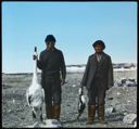 Image of Swan and Loon Held by Two Eskimos [Inuit] of Baffin Land